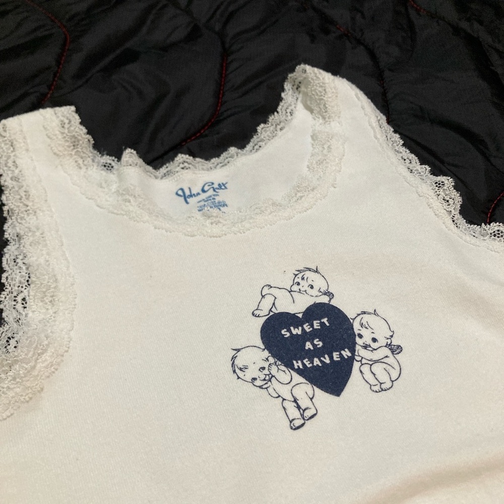 Brandy Melville white tank top with lace.